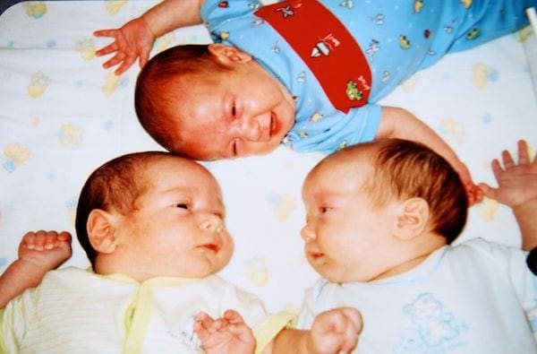 newborn triplet sons together