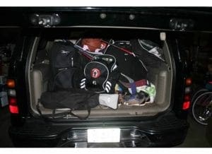 A typical Suburban Saturday........ Loaded with hockey, soccer, basketball and baseball gear back of suburban2