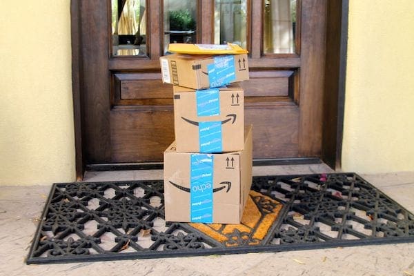 Kids-Ordering-Amazon-Boxes-Outside-Door